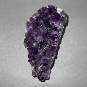 Small Amethyst Crystals on Geode
